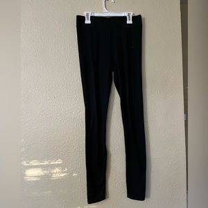 Two pair of black leggings